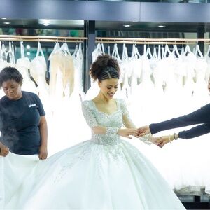 Elegant White Wedding Dress with Silver , Gold, and Pearl Embellishments
